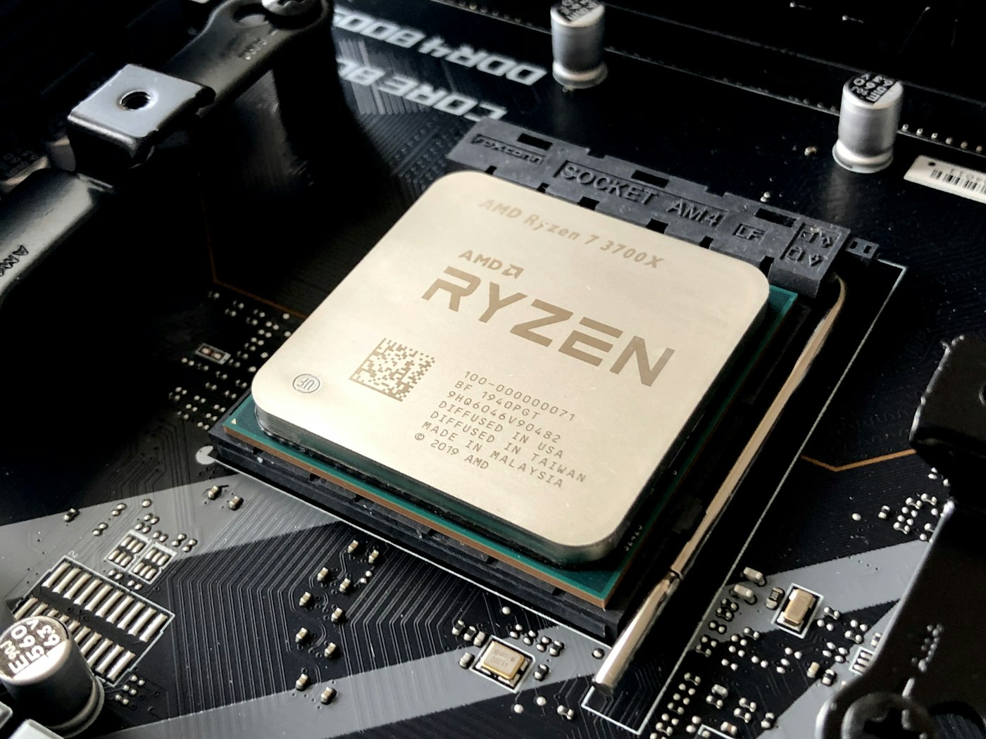 Close-up of a processor seated in a desktop motherboard socket during a hardware upgrade